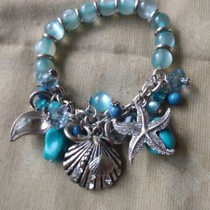 Silver seashell turquoise charm bracelet